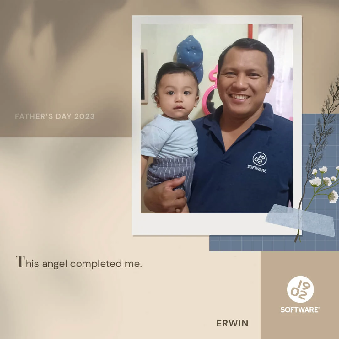 Father holding child with text "Father's Day 2023," "This angel completed me," and "Erwin" with 1902 Software logo and floral decoration.