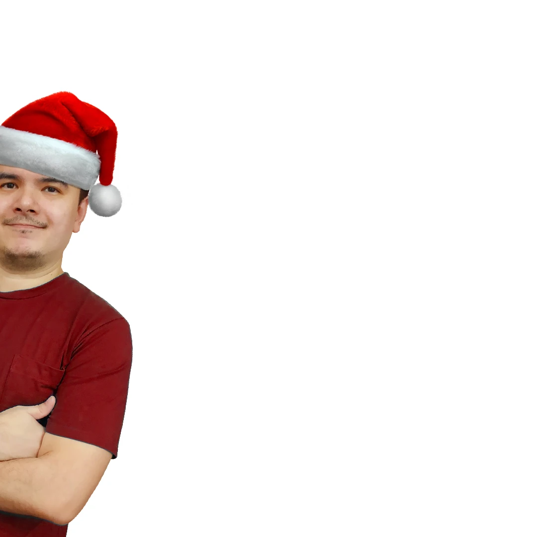 Person wearing a red Santa hat and red shirt with arms crossed on a white background
