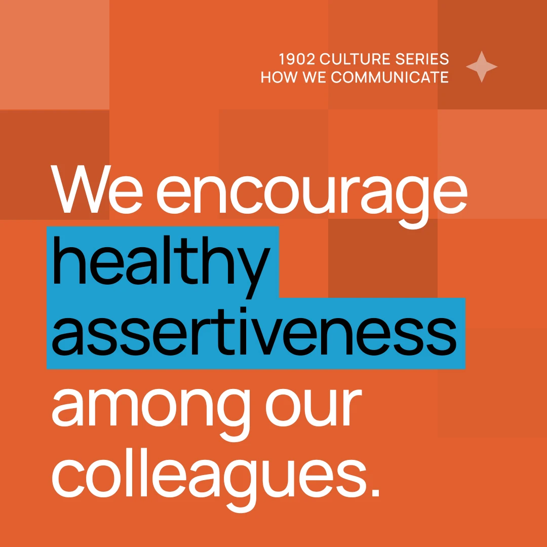 1902 Culture Series How We Communicate: We encourage healthy assertiveness among our colleagues on an orange background.