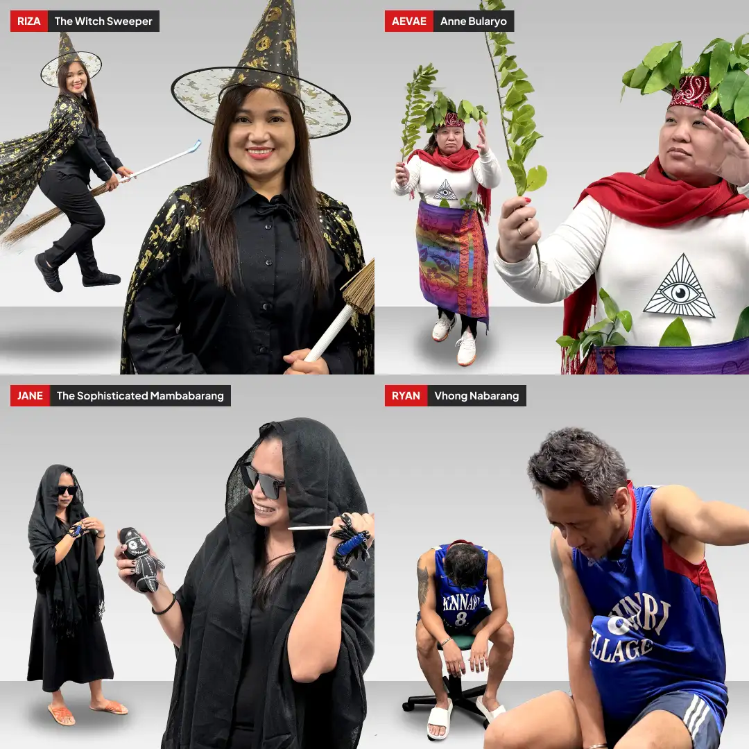 Four employees in Halloween costumes: Riza as a witch with a broom, Aevae in a colorful skirt holding leaves, Jane in black holding dolls, and Ryan in a blue sports jersey sitting on a chair.
