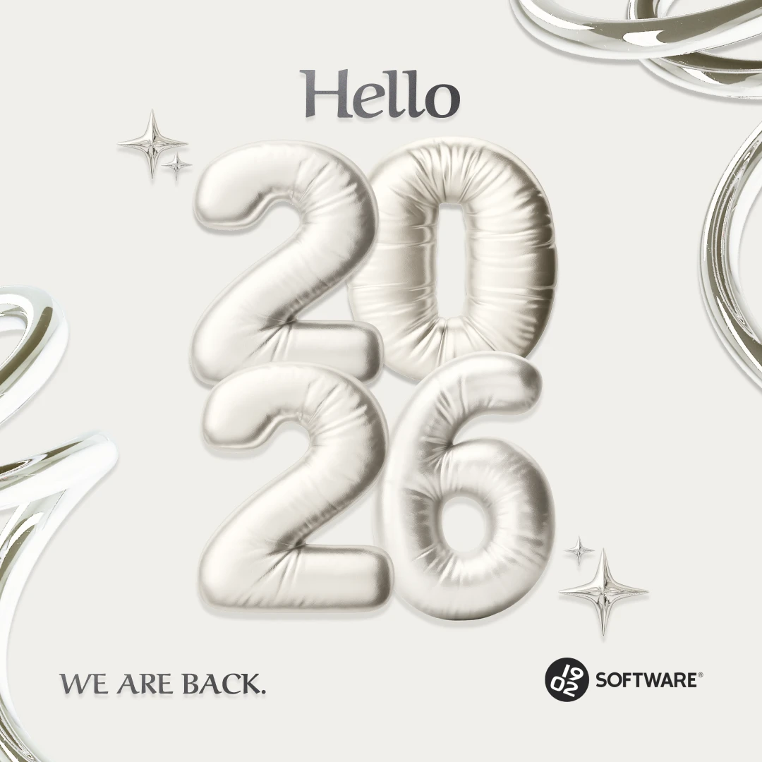 Silver balloon numbers forming "2026" with "Hello" above, surrounded by abstract silver shapes and stars. Text below reads "We are back. 1902 Software."
