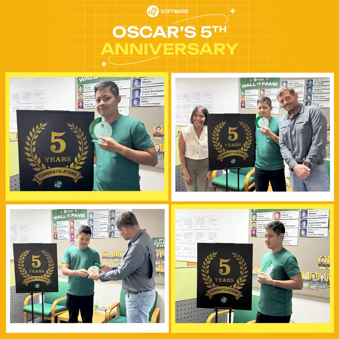 Oscar's 5th anniversary celebration at 1902 Software with a man holding a 5 years congratulations plaque and award in office.